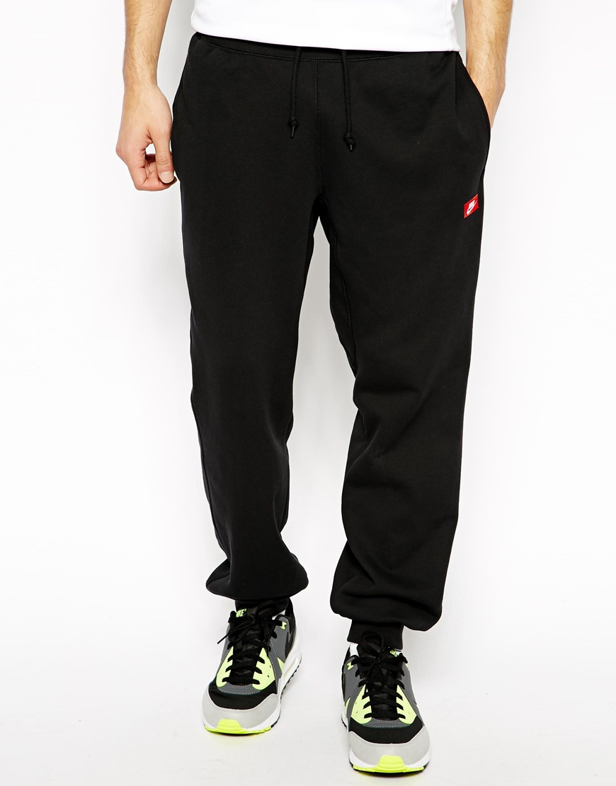 Nike Aw77 Cuffed Sweatpants with Just Do It Logo in Black for Men | Lyst