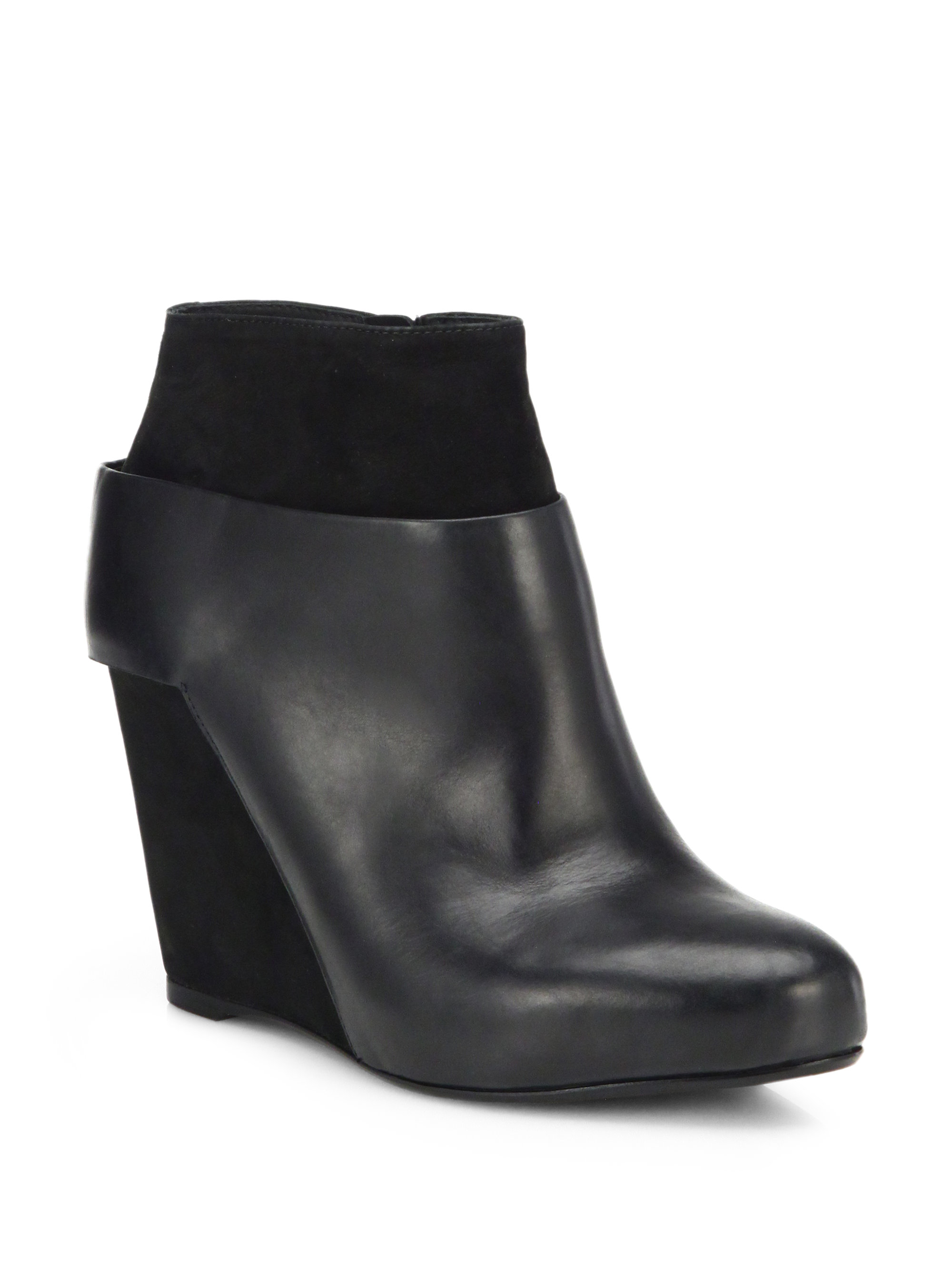 comfortable black wedge booties with arch support