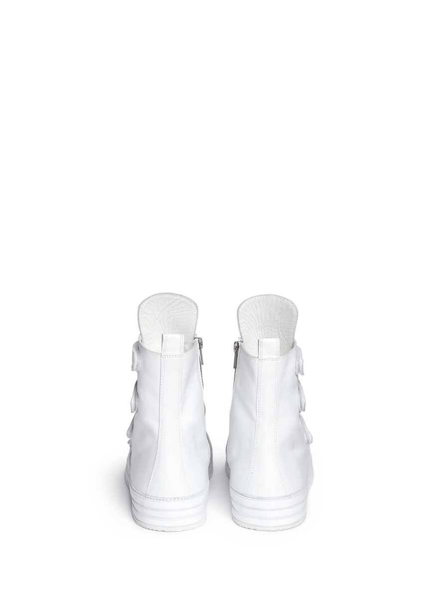 white shoes with velcro straps