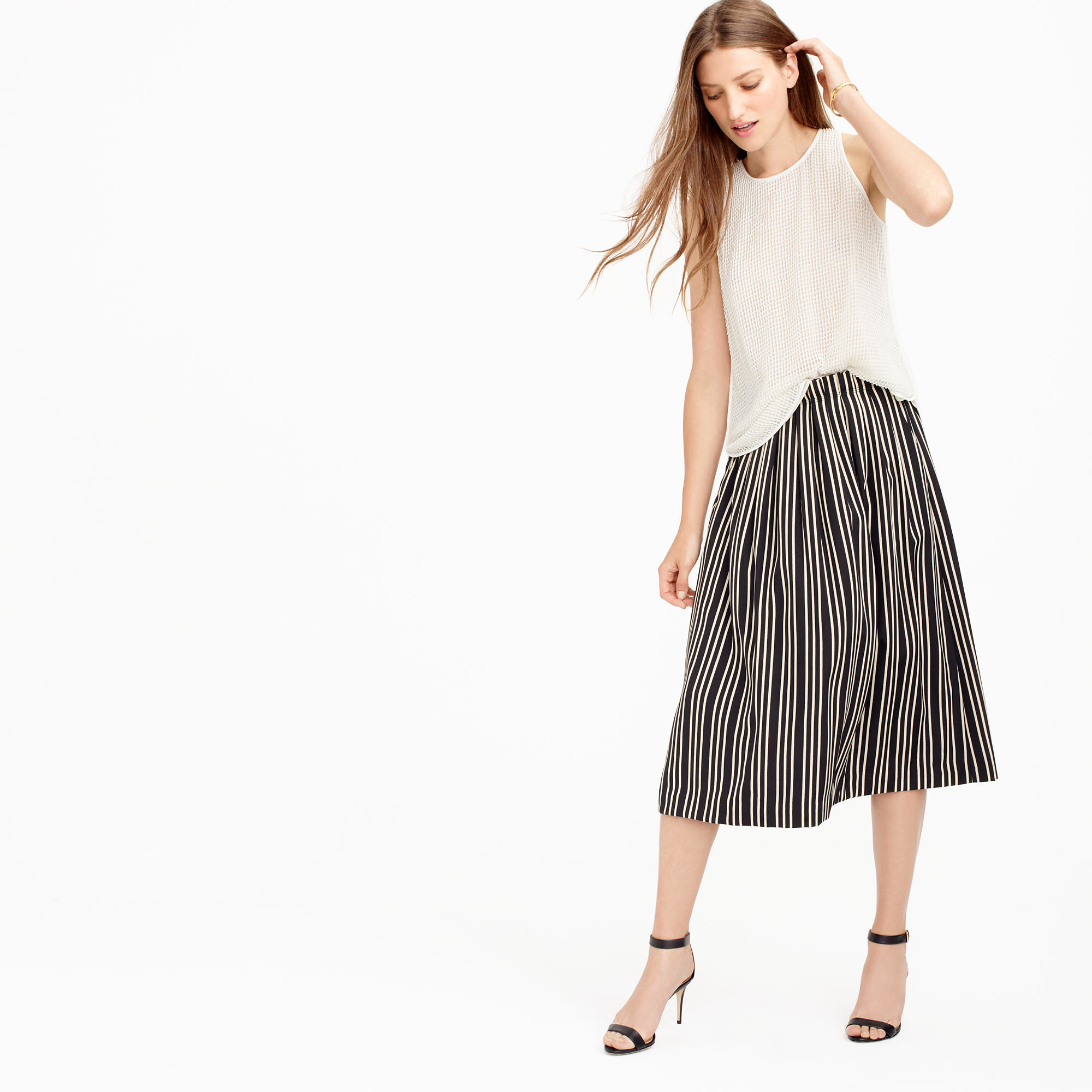 crew neck and pleated skirt