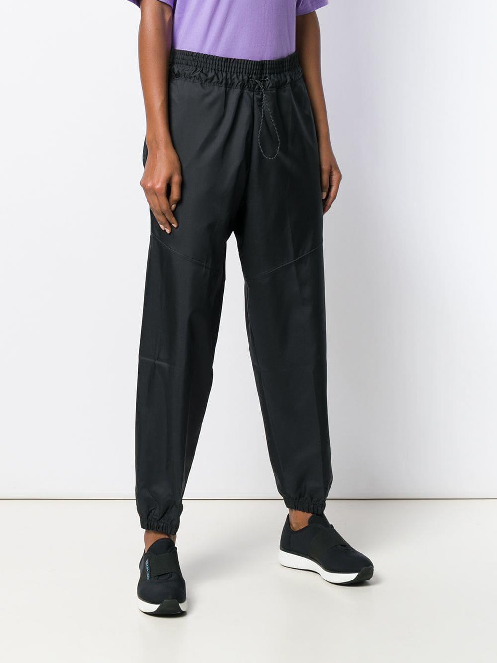 nike swoosh track pant