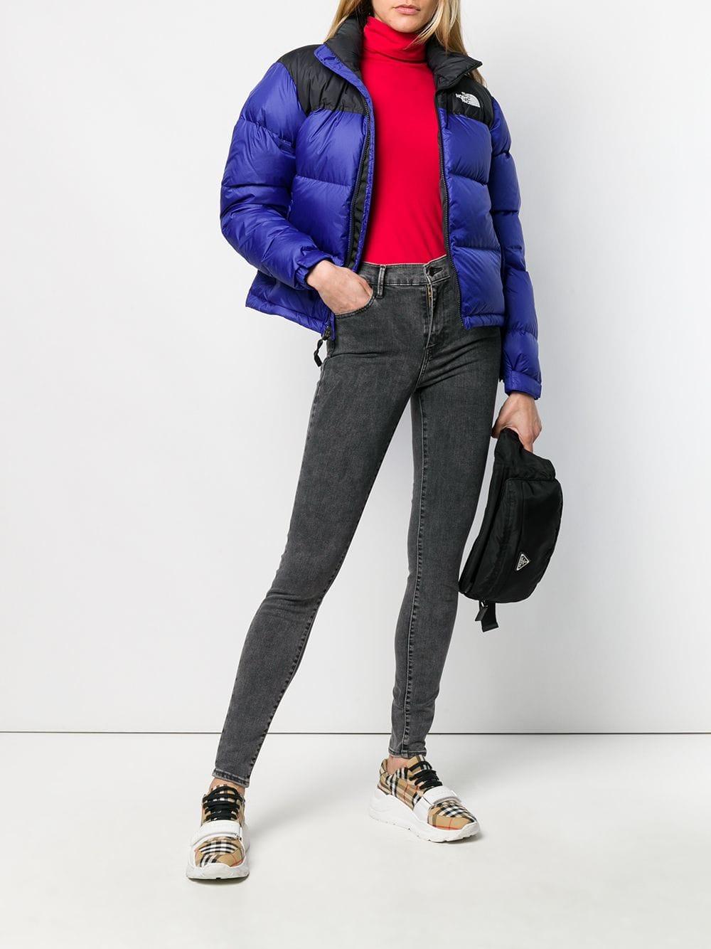 dark blue north face puffer