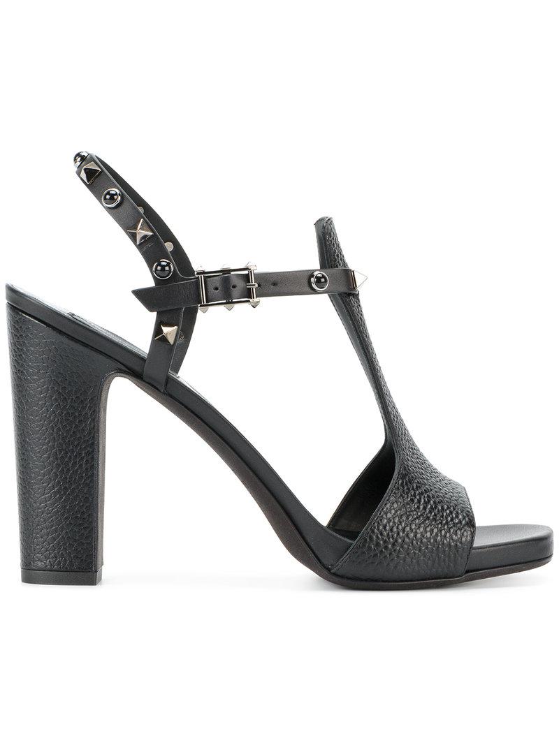  Valentino  Garavani Rockstud Rolling Sandals  in Black Lyst