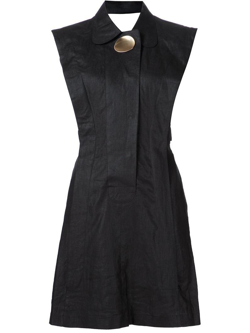 black dress with brooch