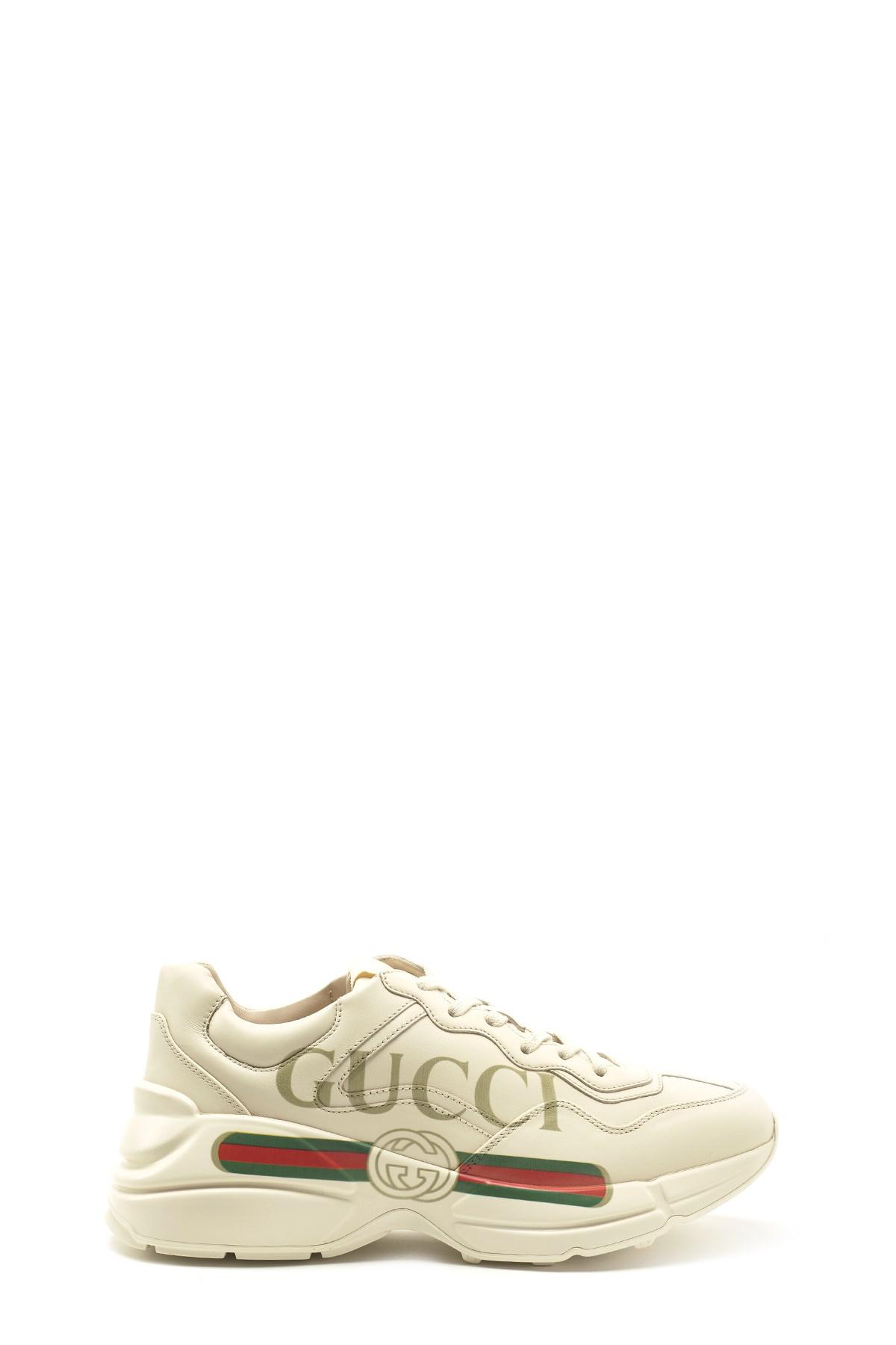 white rhyton gucci logo trainers