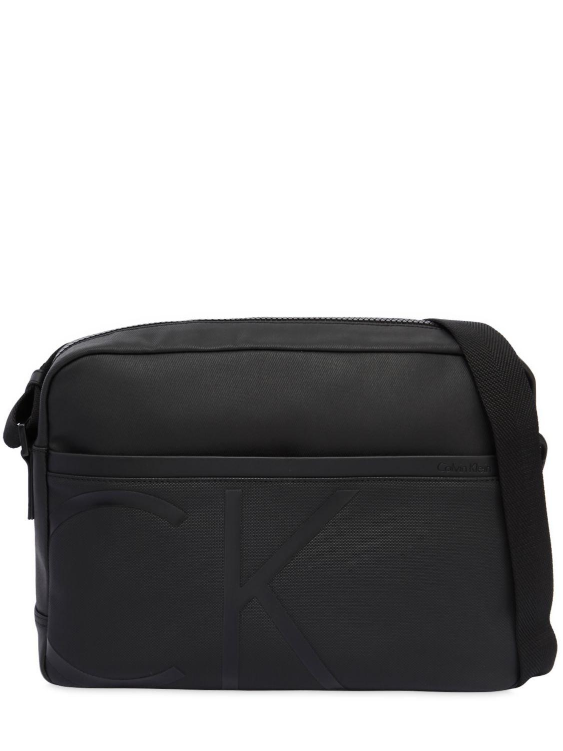 Logo Lyst Messenger Calvin Enduit En Sac Tissu Avec Pour Klein gwSvYw1qCx