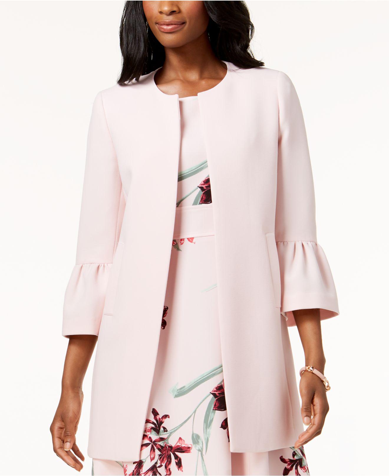 nine west crepe topper with bell sleeve