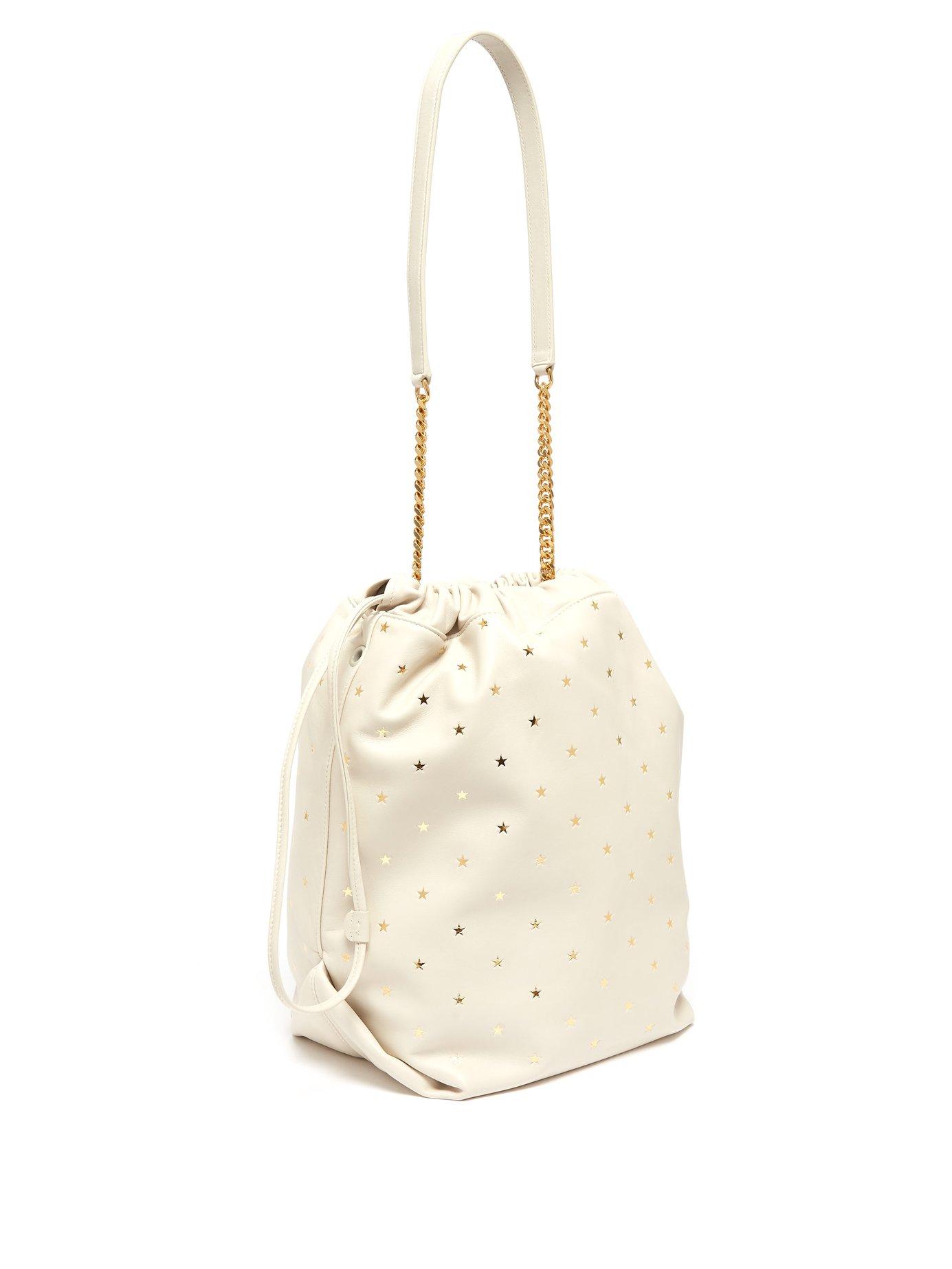 Saint Laurent Teddy Star Embossed Leather Bucket Bag in White Lyst
