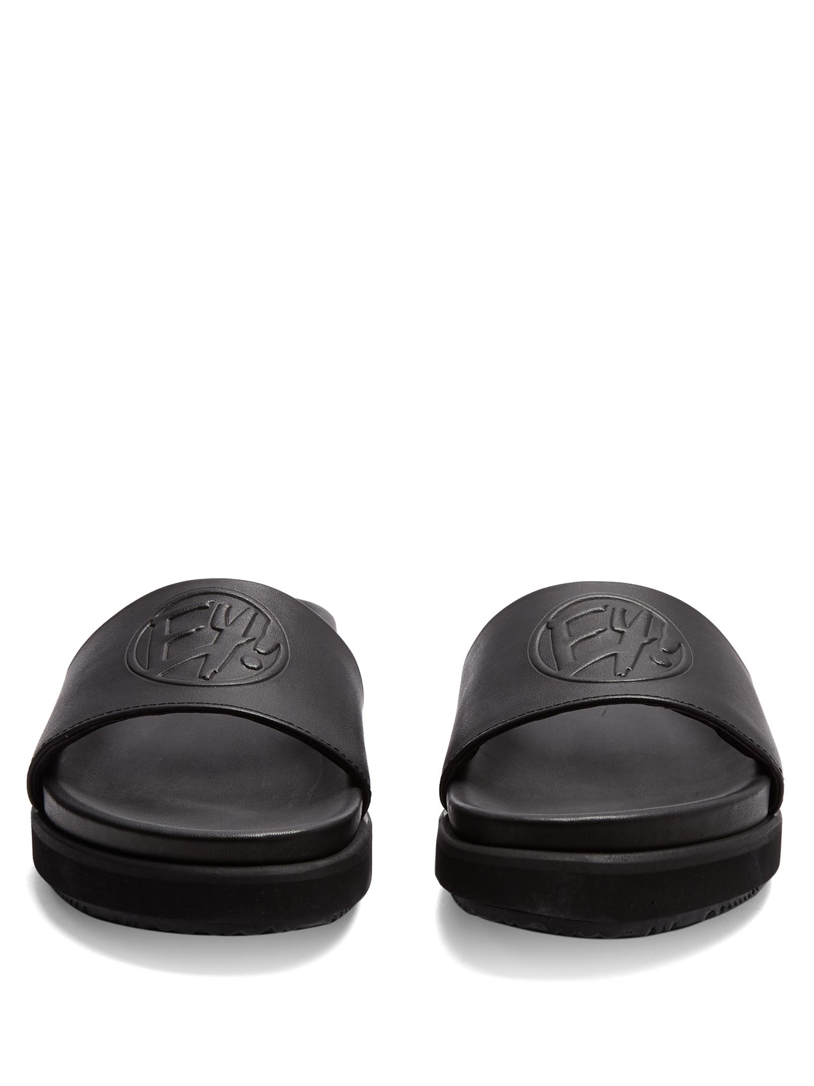 flat black leather slides