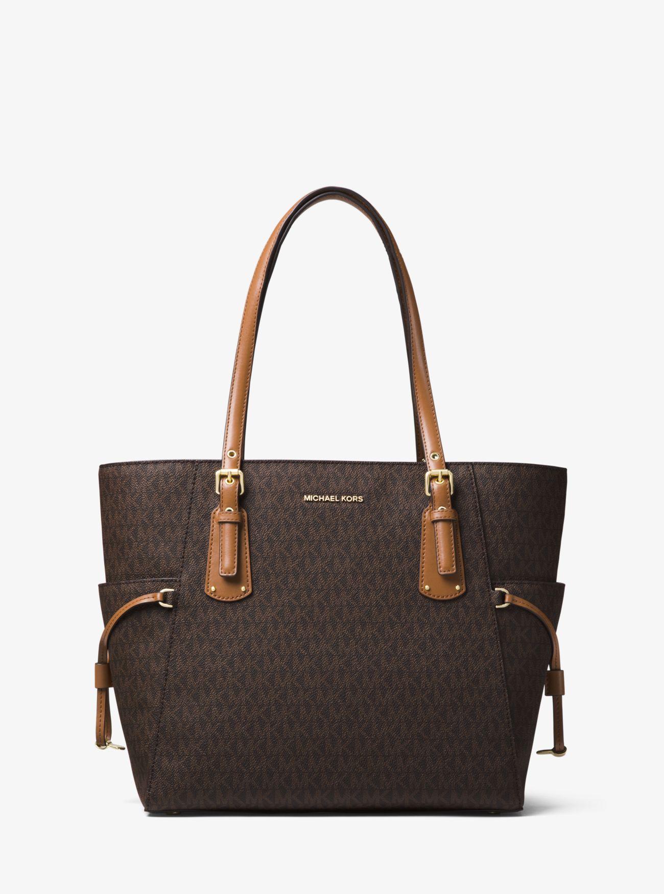 Michael Kors Michael Voyager East West Signature Tote in Brown - Save ...