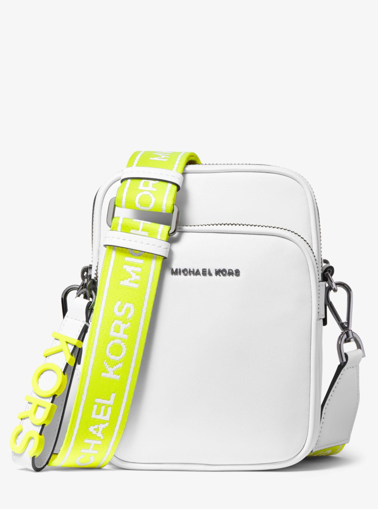Michael Kors Medium Leather Neon Logo Tape Crossbody Bag in White - Lyst