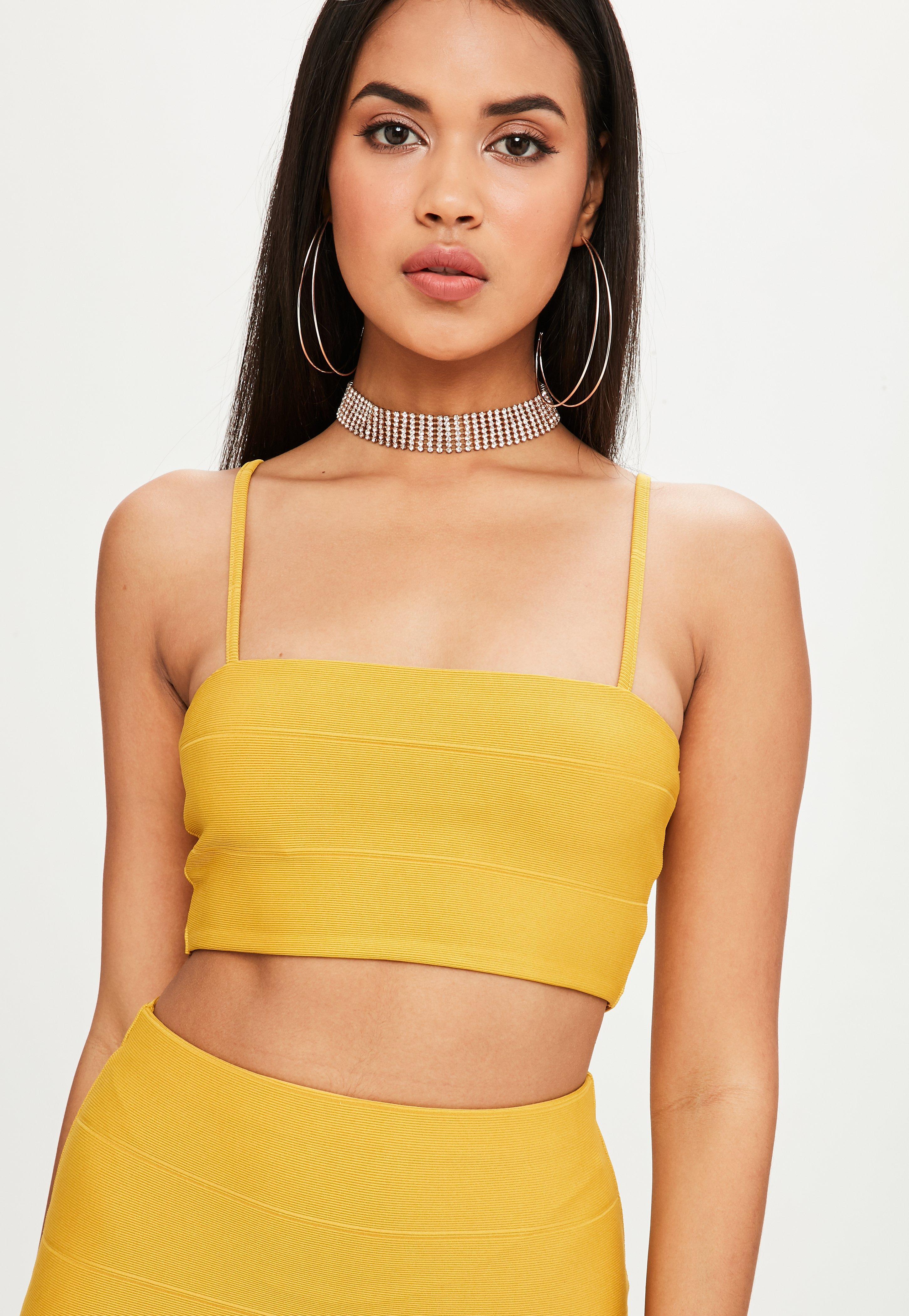 Yellow crop top Discover the latest range of crop tops at ASOS. Shop the range of styles from lace crop tops to sequin crop tops in your favourite colours. your browser is not supported. Yellow (14) Price Range. Price Range Selected. £5 - £ £5. £5. £ £ styles found. Glamorous long sleeve crop top .