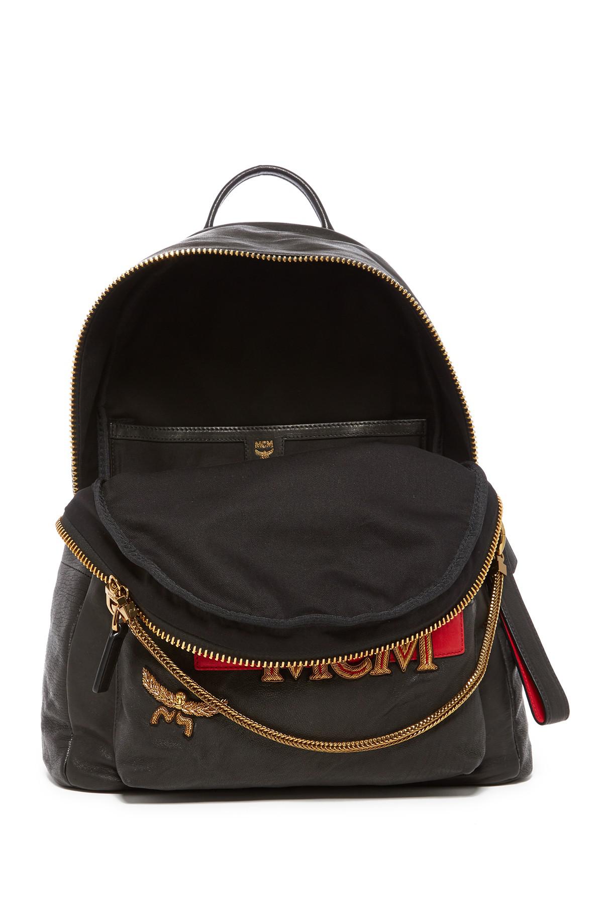 MCM Stark Leather And Genuine Fox Fur Detail Insignia Medium Backpack in Black - Lyst
