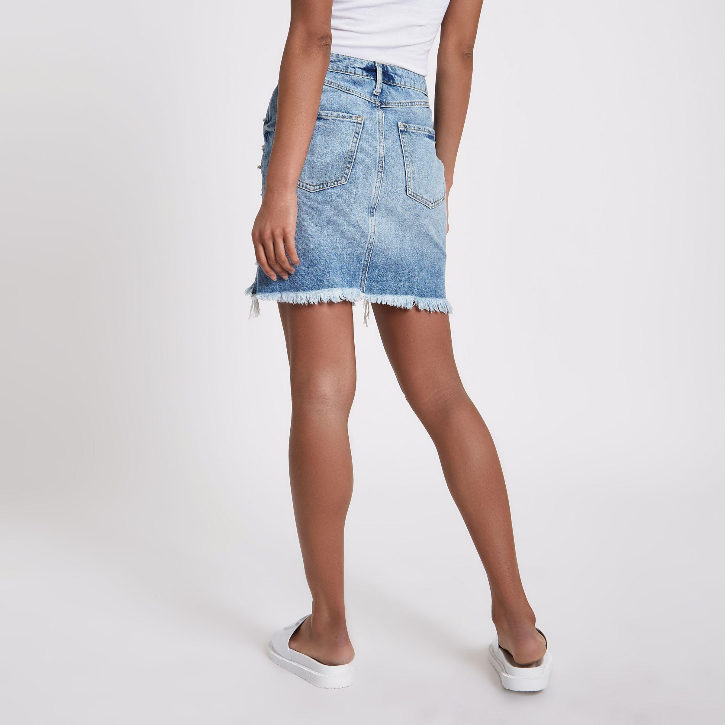 Lyst - River Island Mid Blue Faux Pearl Ripped Denim Mini Skirt in Blue