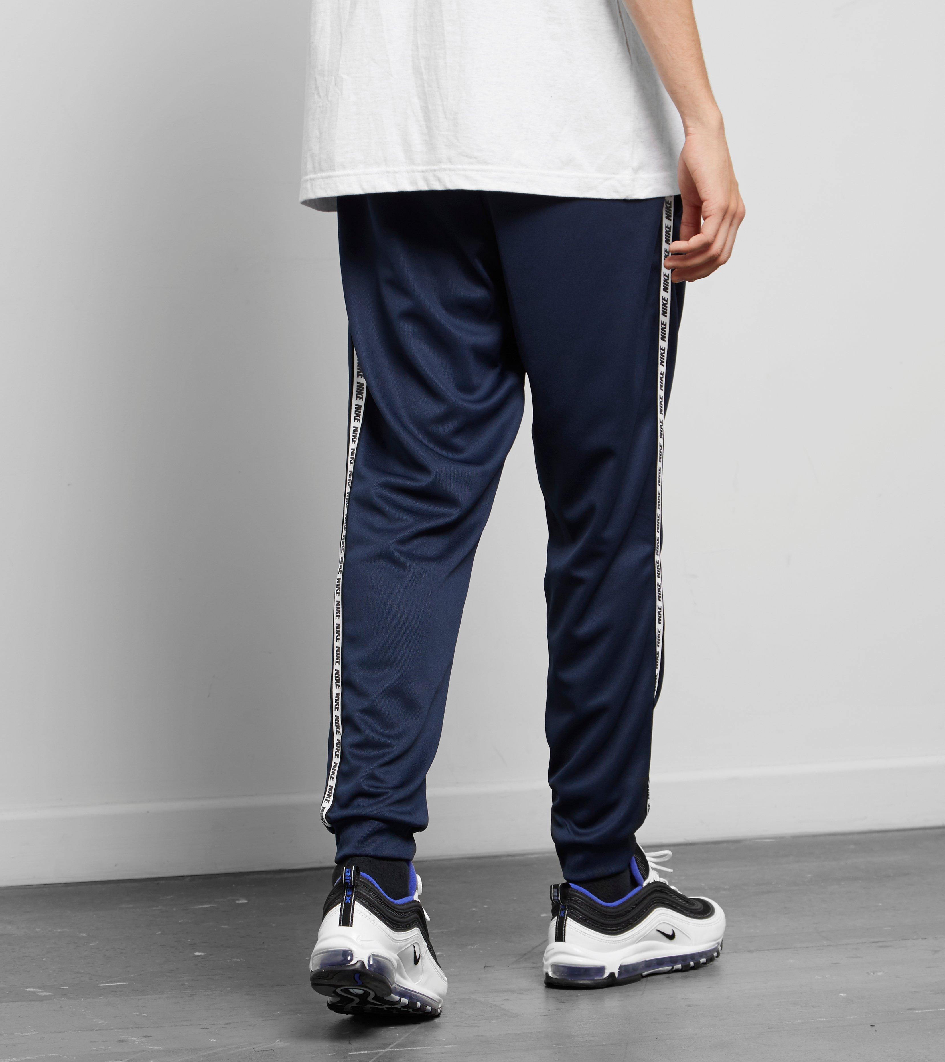 nike tape cuffed track pants
