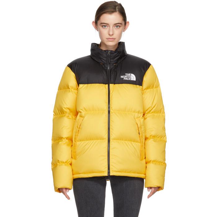 north face black and yellow