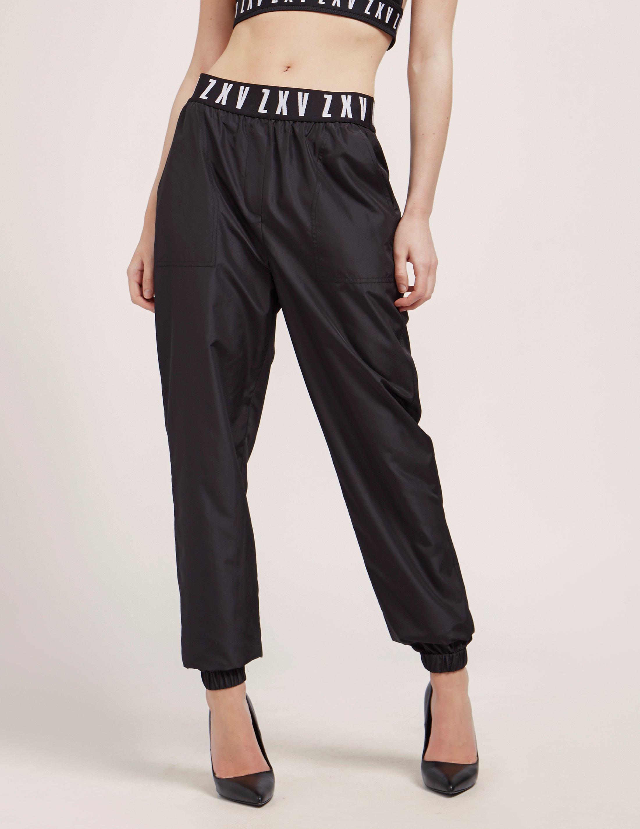 black nylon track pants