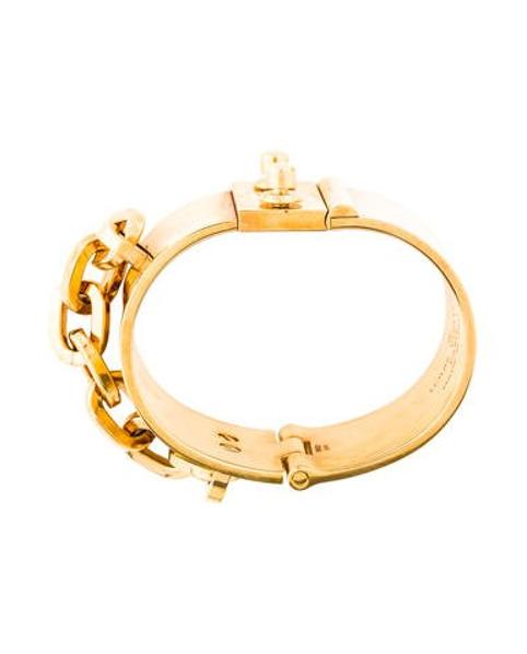 Lyst - Louis Vuitton Lock Me Manchette Bracelet Gold in Metallic