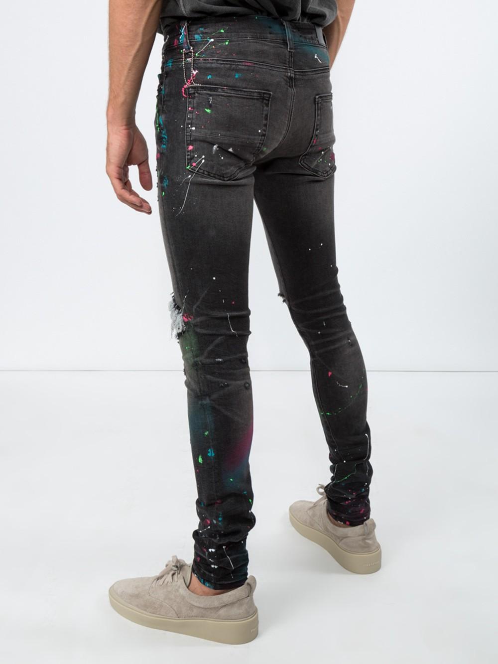 mens black jeans with paint splatter