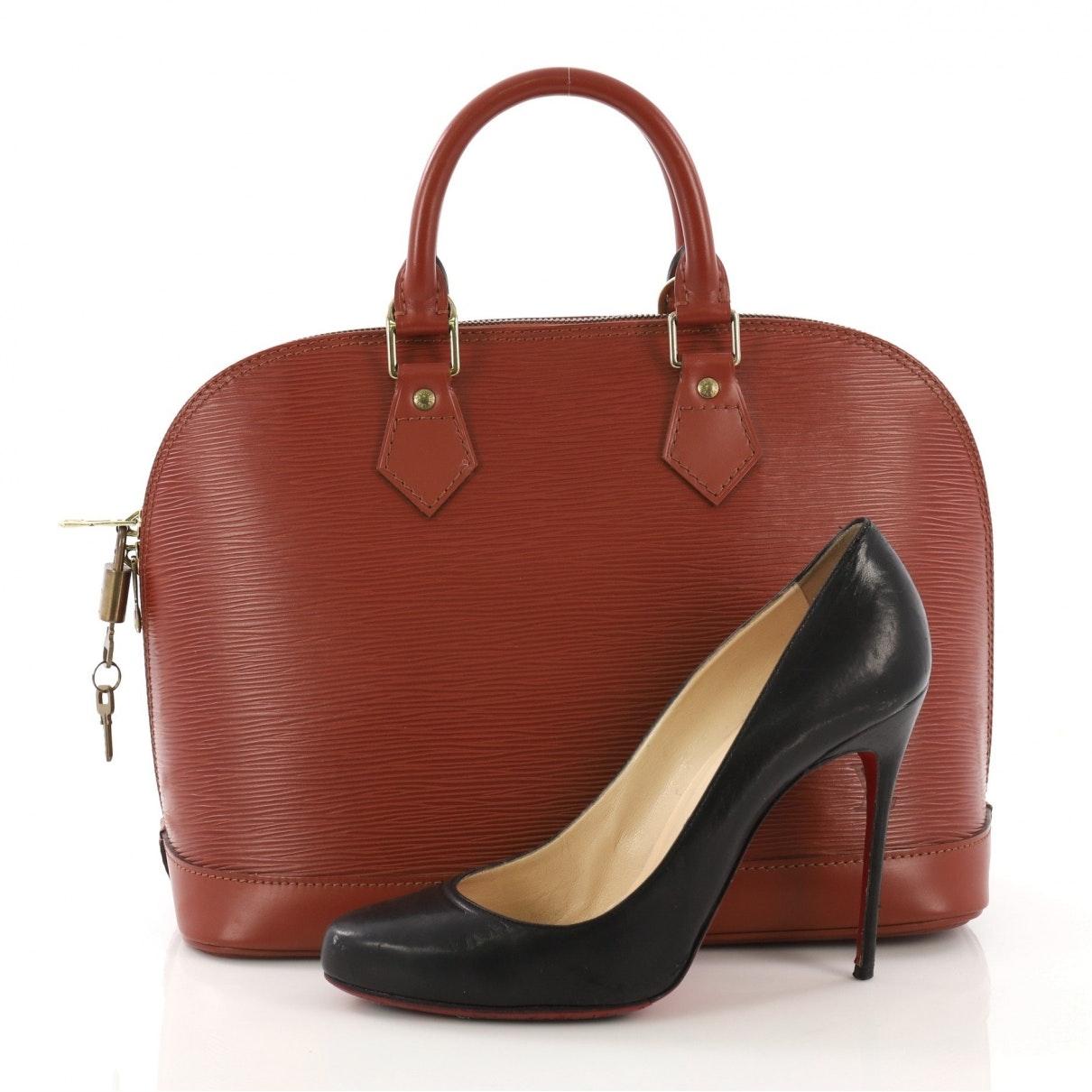 Louis Vuitton Alma Brown Leather Handbag - Lyst