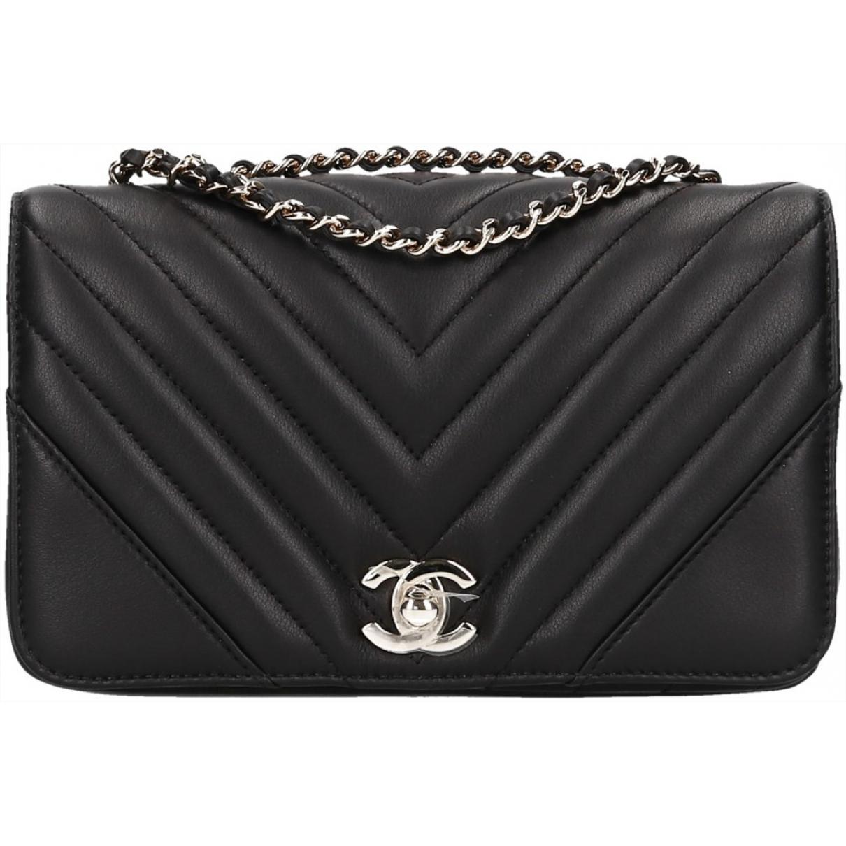 Chanel Pre-owned Black Leather Handbags in Black - Lyst