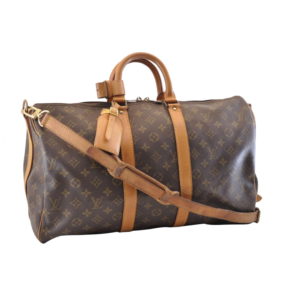 Louis Vuitton Vintage Keepall Brown Cloth Travel Bag in Brown - Lyst