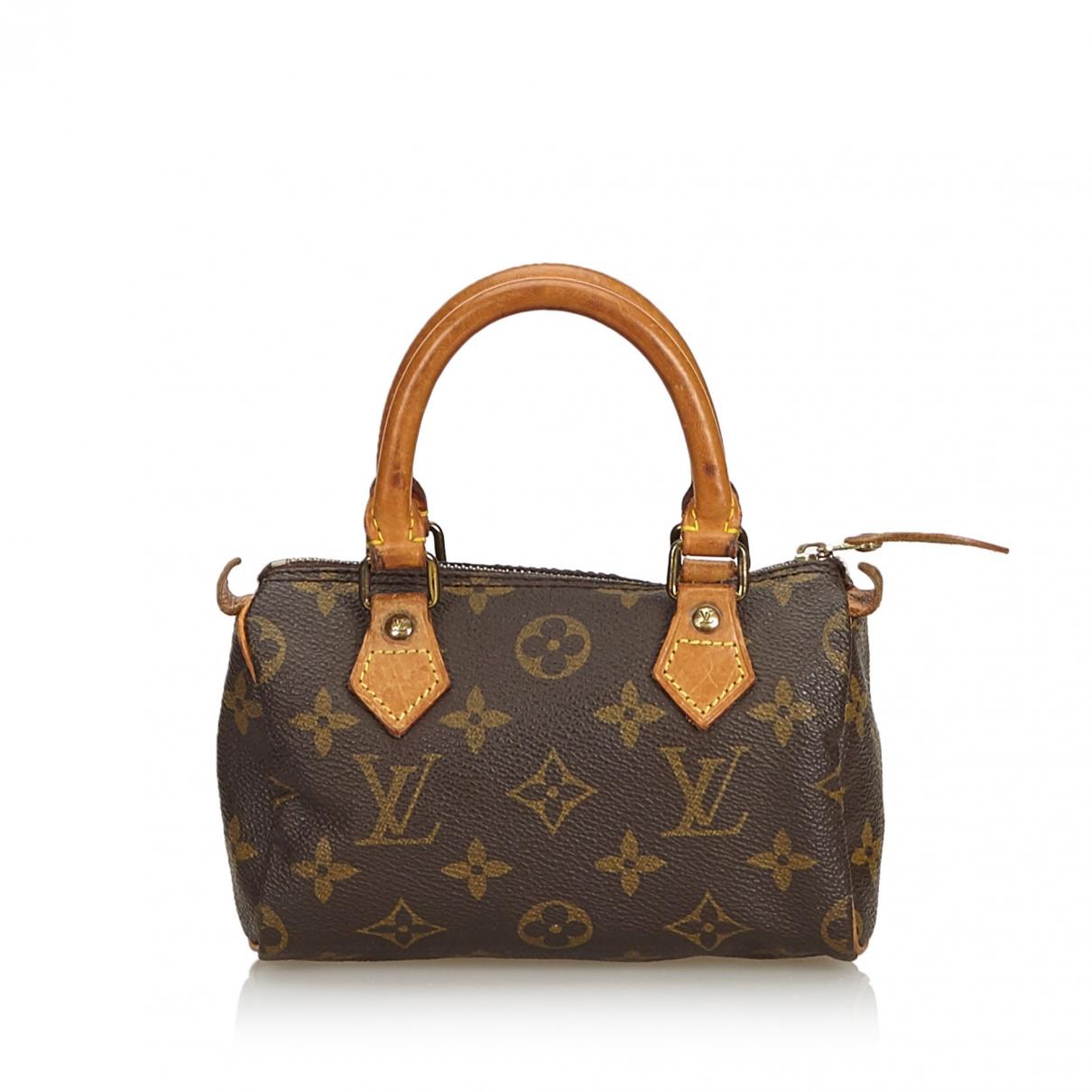 Sold at Auction: LOUIS VUITTON MONOGRAM SPEEDY BAG - France, April 1998.  Monogram canvas with leather handles and detailing. With lock, no key.  Interior flap pocket. Numbered SD0948. 8 1/2 H x