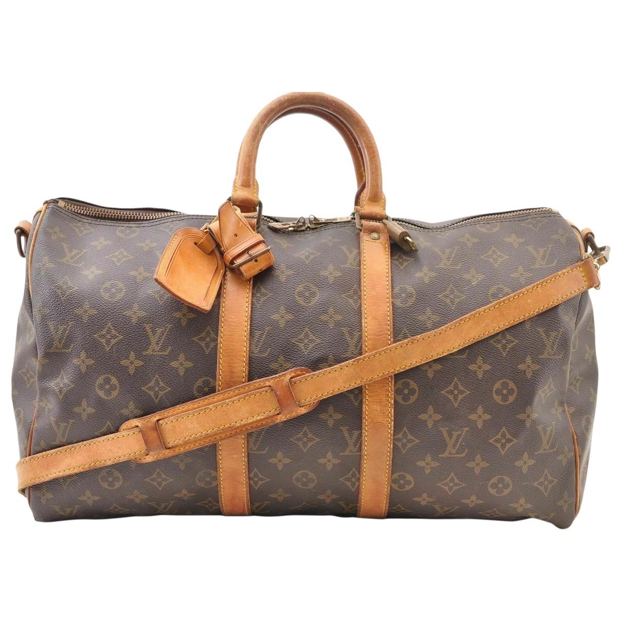 Louis Vuitton Pre-owned Vintage Keepall Brown Cloth Travel Bags in Brown - Lyst