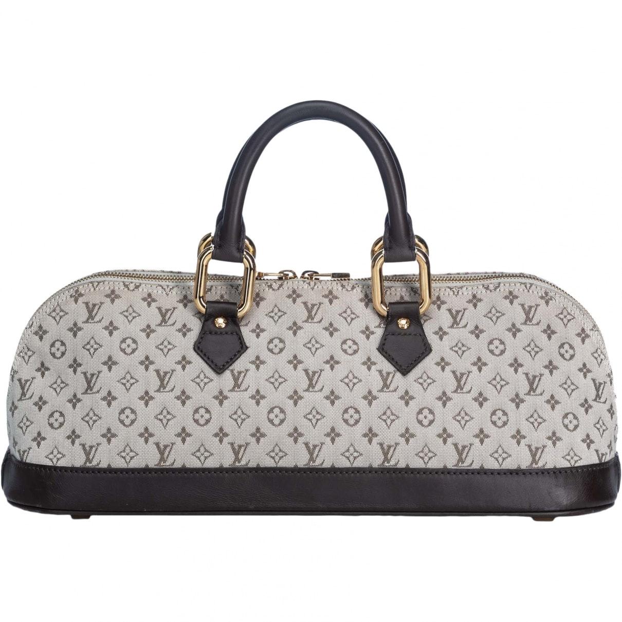 Are The Louis Vuitton Bags At Dillard's Real Estate