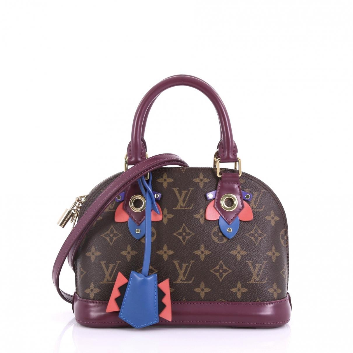 Louis Vuitton Alma Brown Cloth Handbag in Brown - Lyst