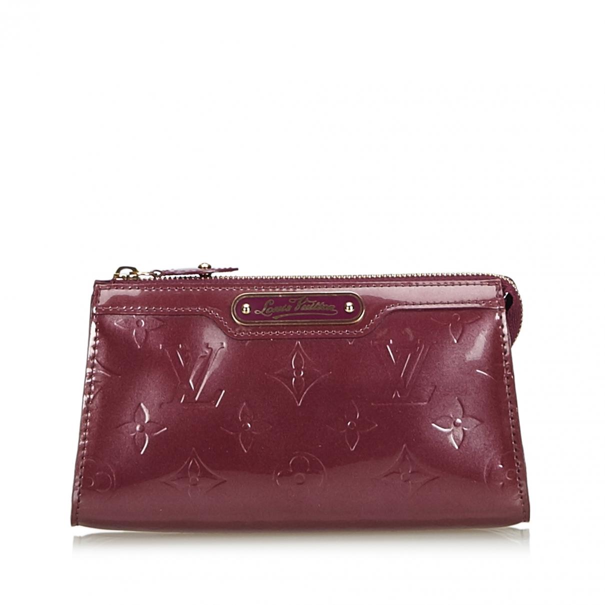 Louis Vuitton Pre-owned Purple Patent Leather Clutch Bags in Purple - Lyst
