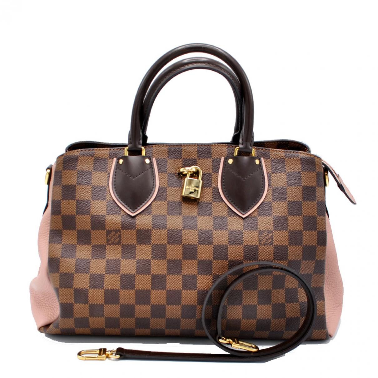 Handbag Review: Louis Vuitton Cluny BB - The Brunette Nomad