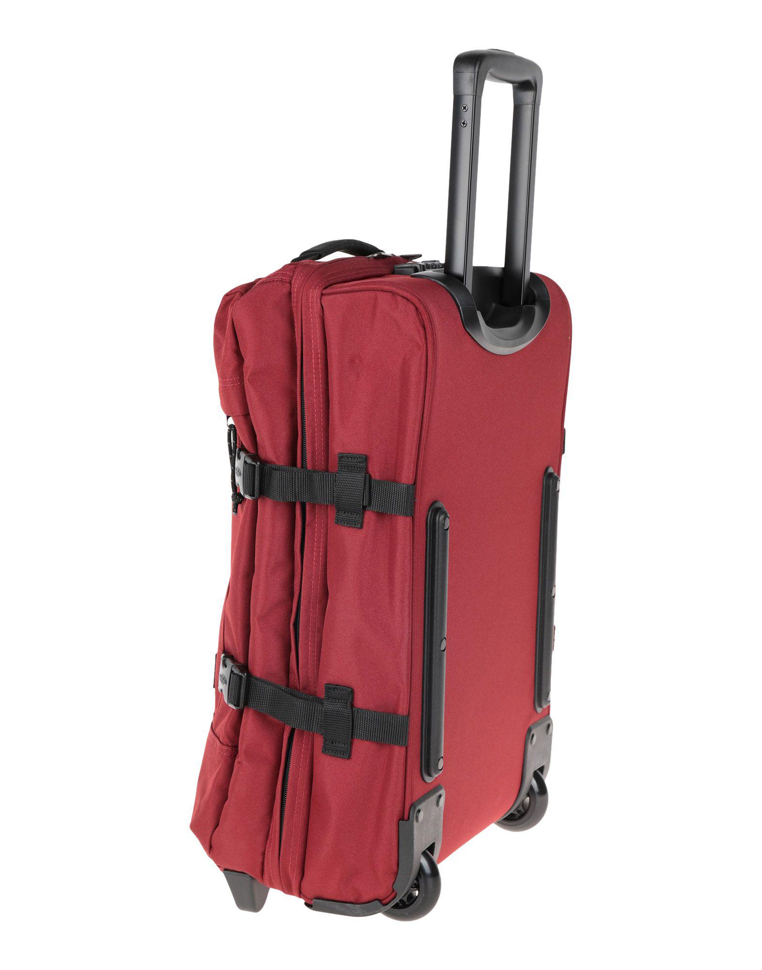 Lyst Eastpak Wheeled luggage in Red