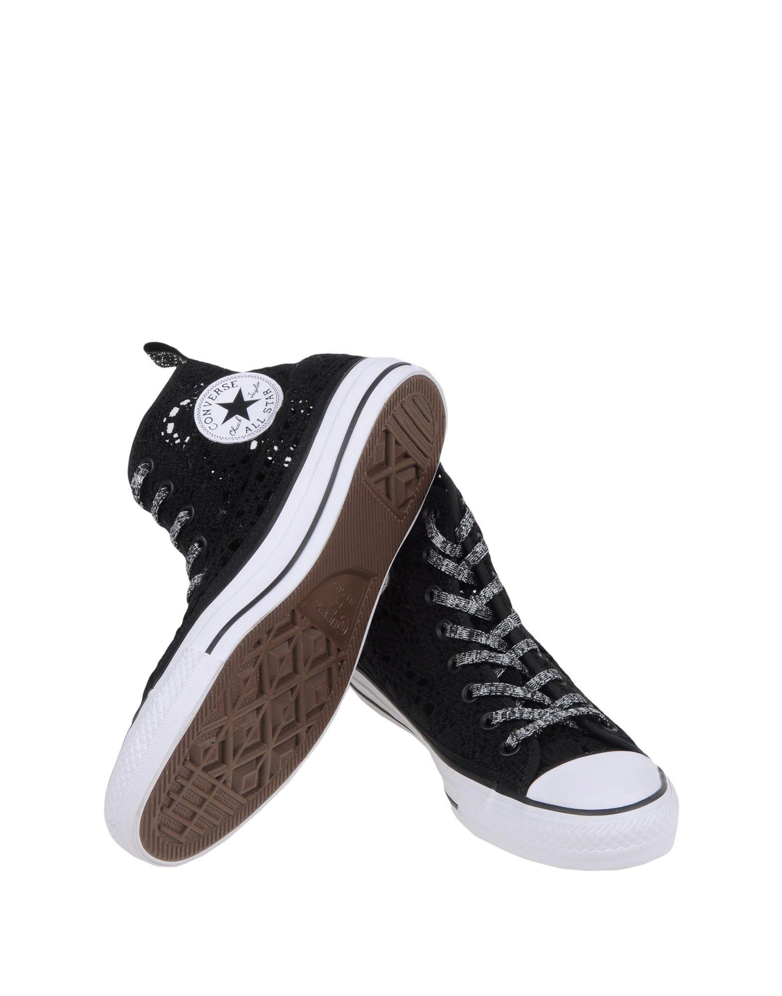 black converse high tops with design